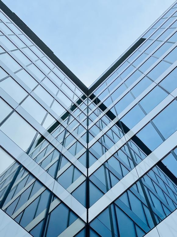 Low angle view of modern office windows skyscraper_resize