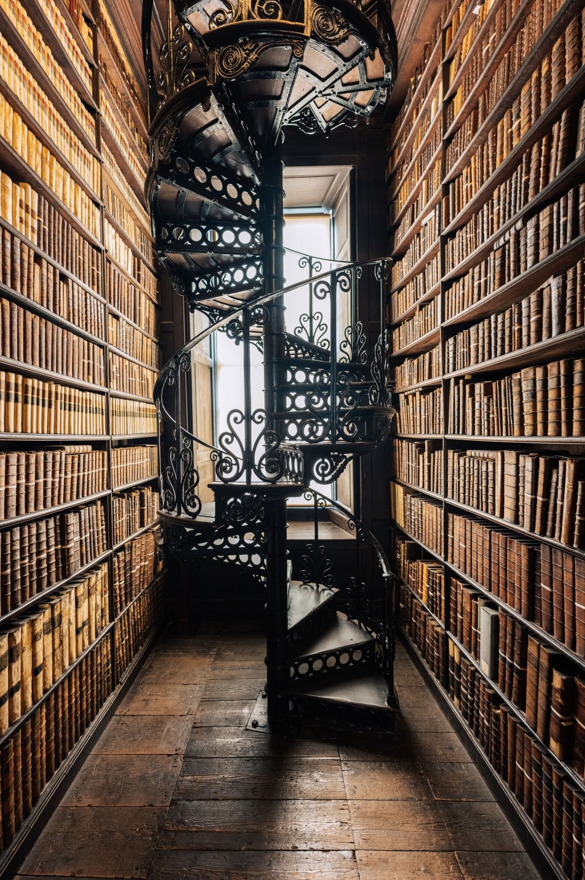 Old library, books and spiral staircase_resize