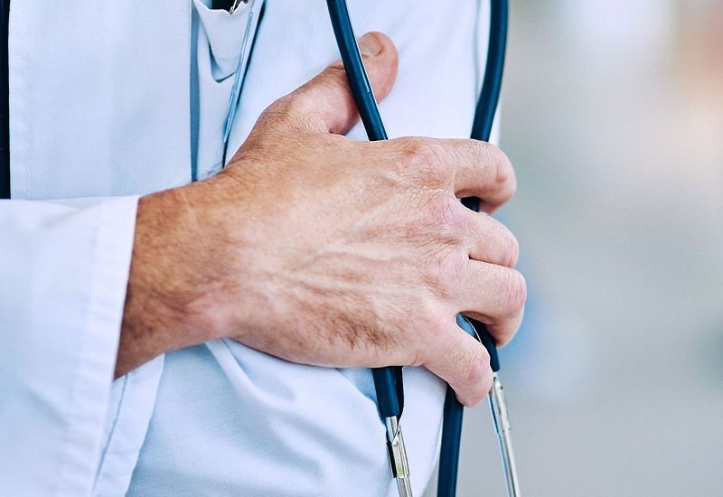 male-doc-hands-800x550